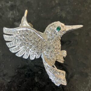 Elegant Silver Bird Brooch with Green Accent